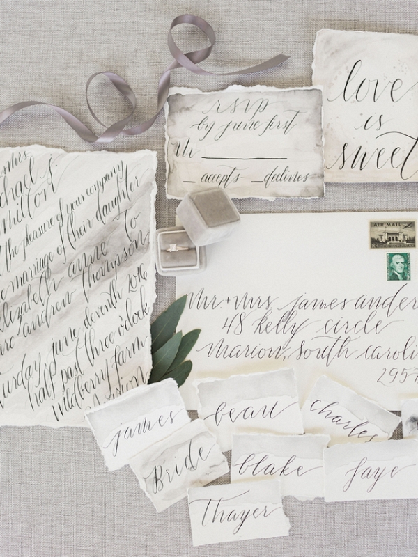 Calligraphy on a Grey Watercolor Wedding Invitation 