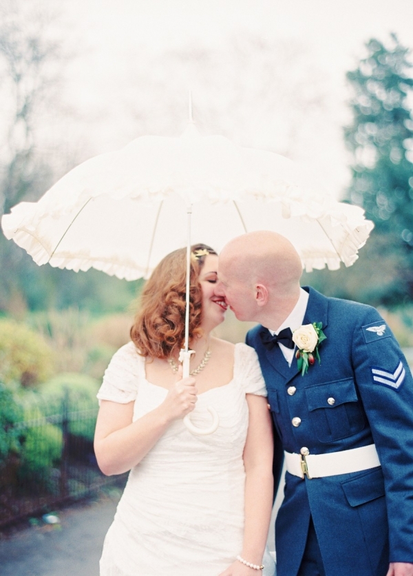 1940s Inspired Bride & Groom Under a Parasol | Photography - Taylor & Porter