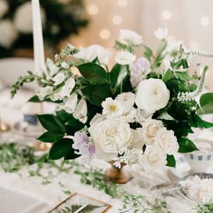 White and periwinkle wedding centerpiece