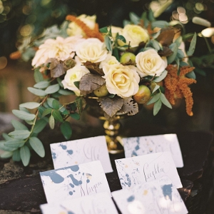 Floral Centrepiece and calligraphy escort cards