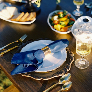 Blue and gold place setting on Chic Vintage Brides