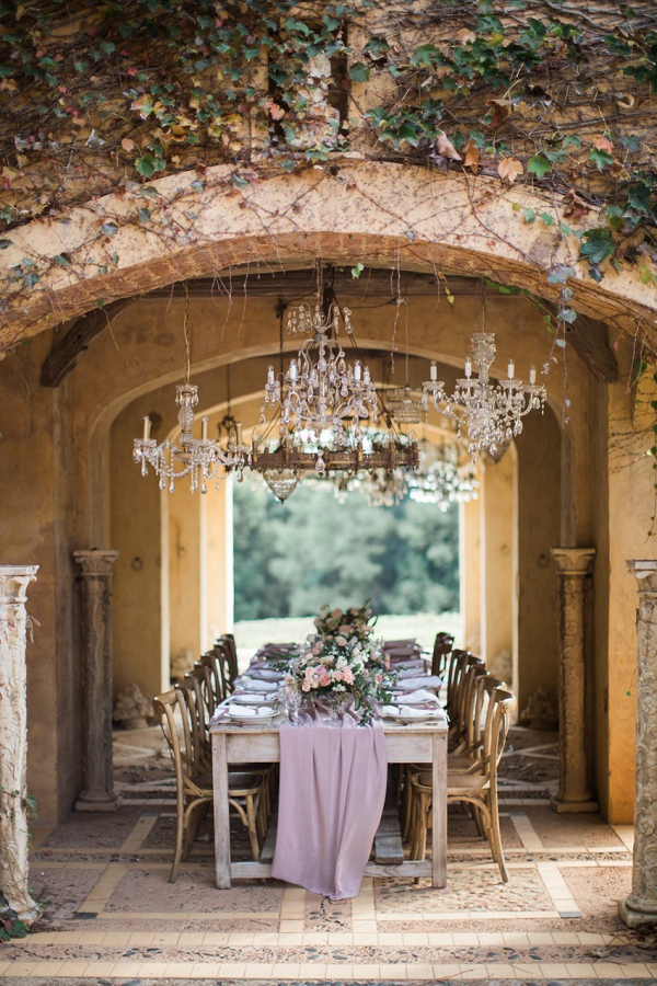 Elegant Chandelier Lit Wedding Table