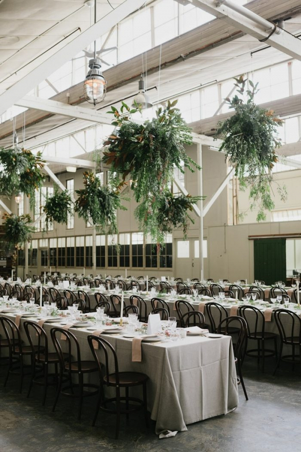 Wedding reception with hanging greenery