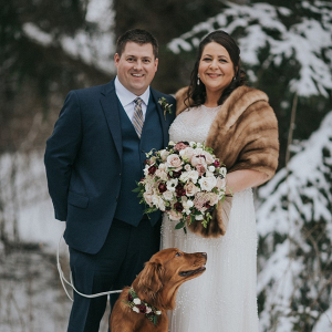 Bride and groom with pup