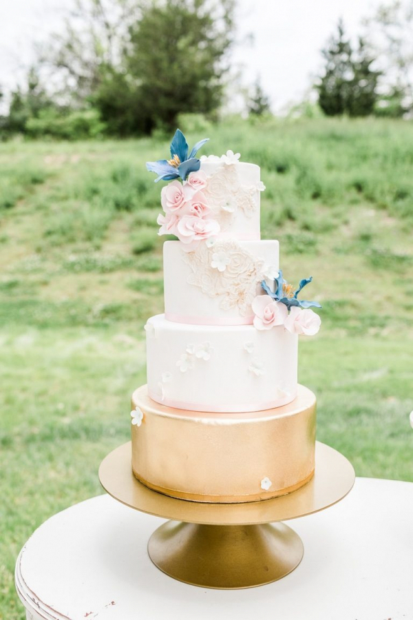 Pink and gold wedding cake with sugar flowers