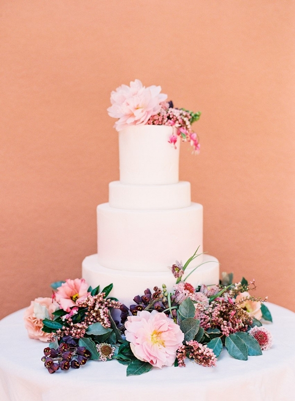 White wedding cake with flowers on Chic Vintage Brides