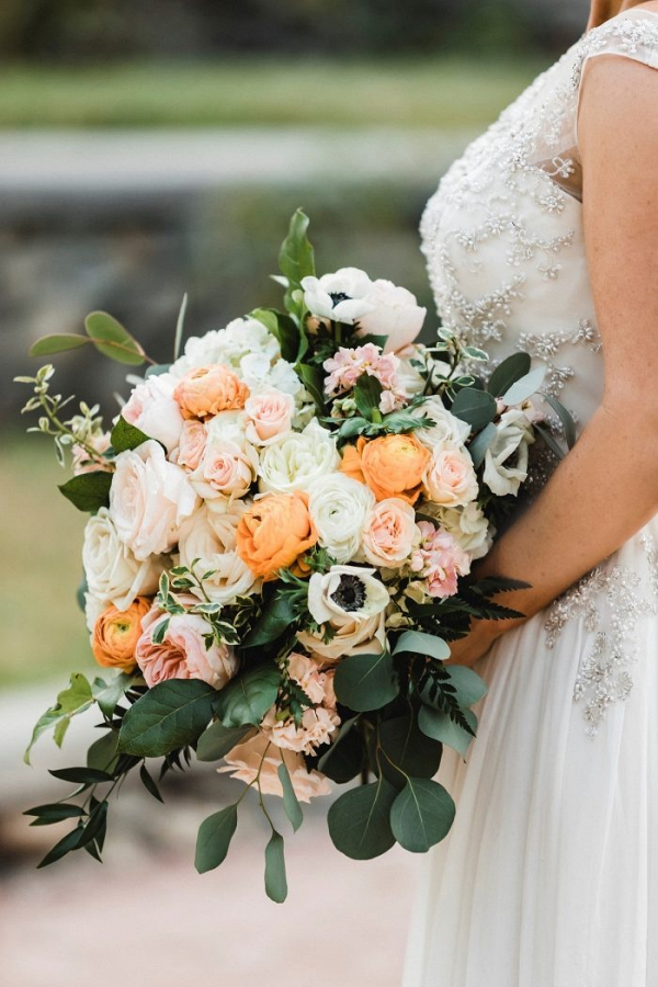 Peach and yellow floral bridal bouquet