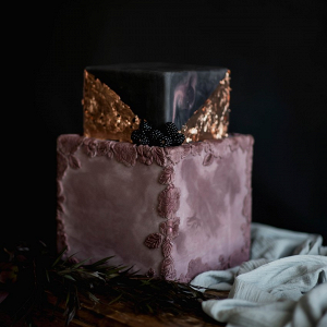 Purple and gold square wedding cake