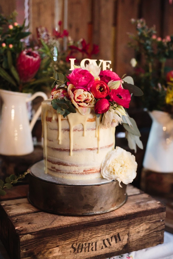 Drizzle Floral Topped Wedding Cake