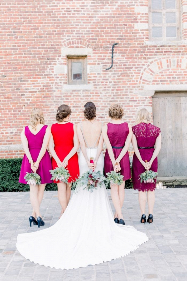 Bridesmaids in magenta and red