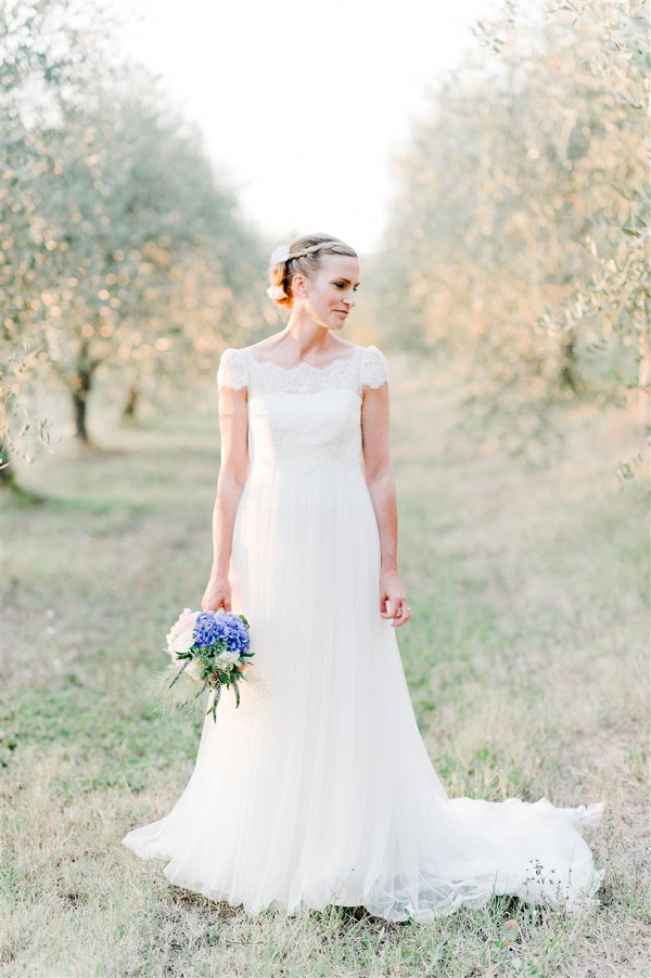 Beautiful Bride in an Off the Shoulder Wedding Dress