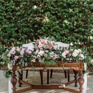 Floral covered sweetheart table