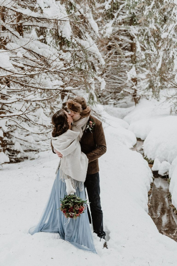 Snowy forest wedding in the mountains