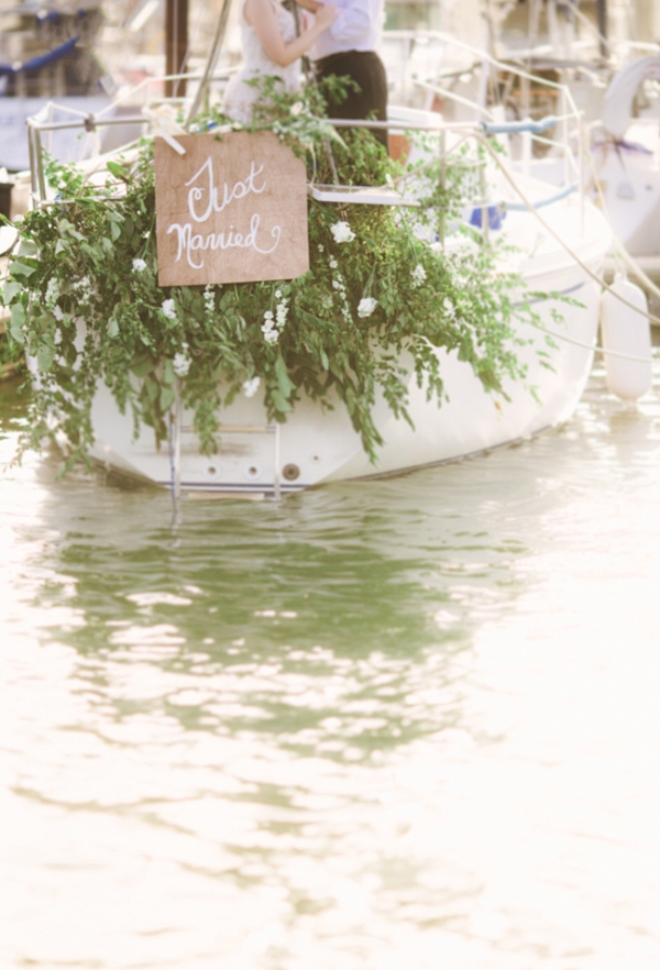 Sailboat Honeymoon Featuring A Boat Draped In Florals