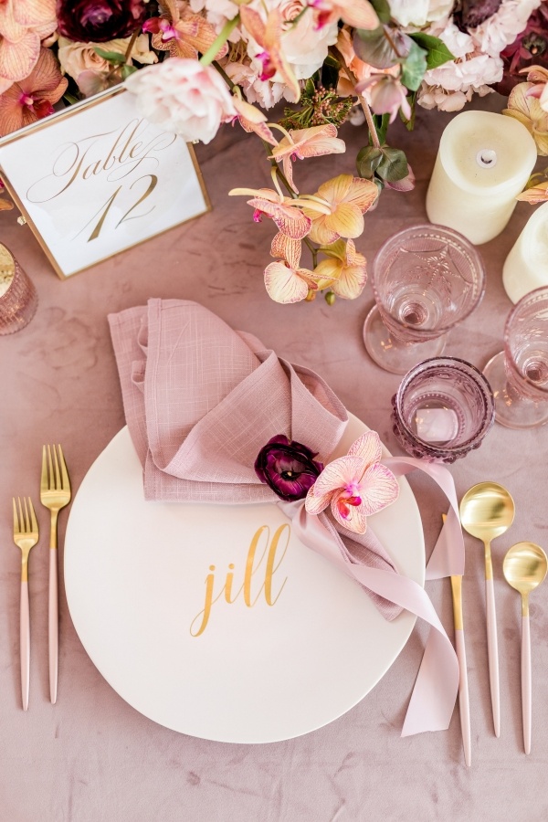 Mauve and gold place setting