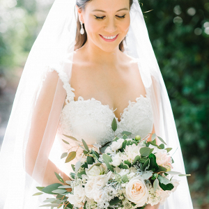 Bride with soft peach bouquet