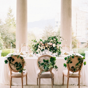 elegant greenery covered table on Elizabeth Anne Designs