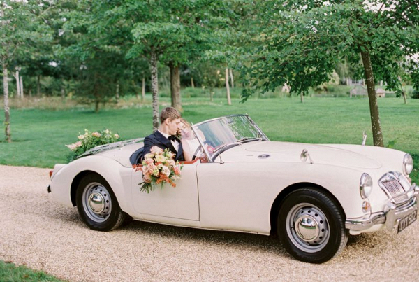 Vintage car wedding portrait