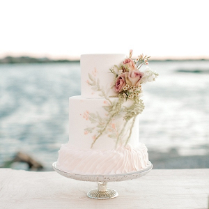 Floral and ruffle wedding cake