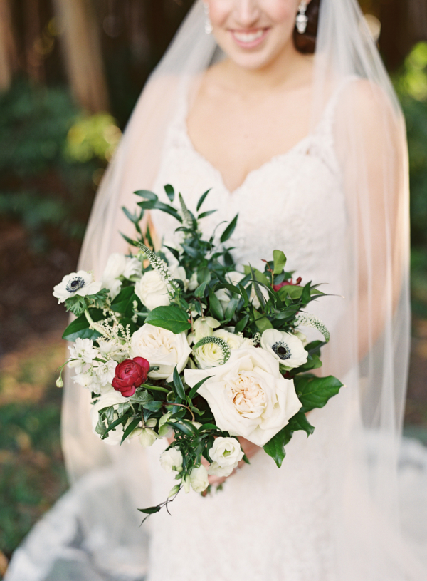 White bouquet with pops of red