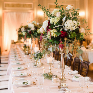Classic tall reception centerpieces with hydrangeas and roses