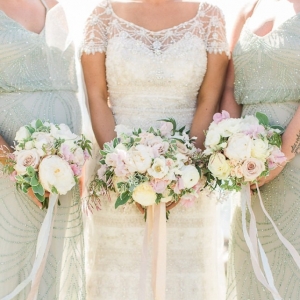 Blush and white bouquets with sage bridesmaid dresses