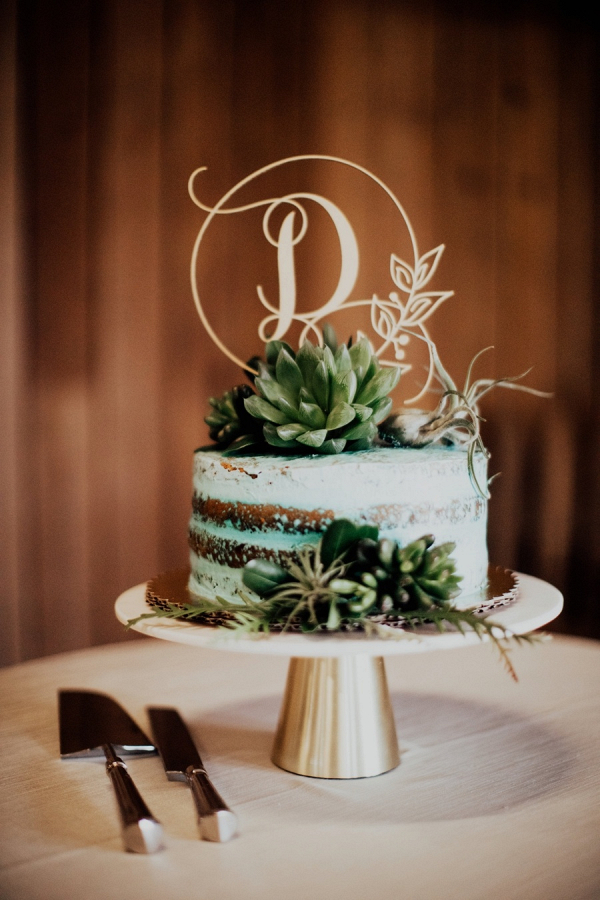 Semi naked wedding cake with succulents