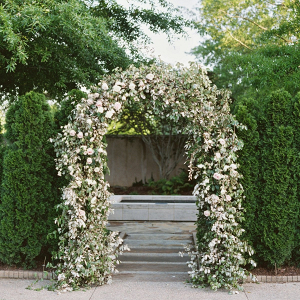 Greenery and rose floral arch