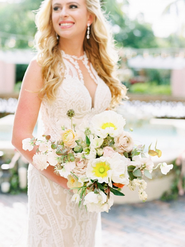 Peach, white, and yellow bridal bouquet