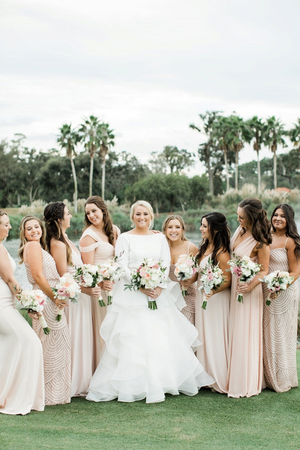 Bridesmaids in long blush gowns