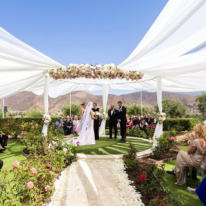 Dramatic circle wedding ceremony with draping