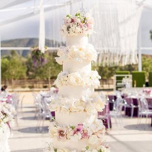5 layer wedding cake with fresh flowers