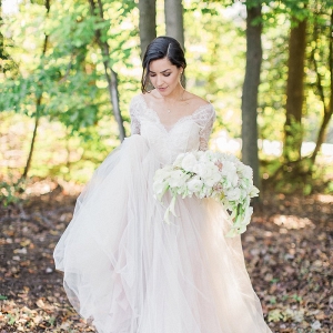 Bride in long sleeve lace gown on Every Last Detail