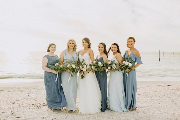 Mismatched long blue bridesmaid dresses