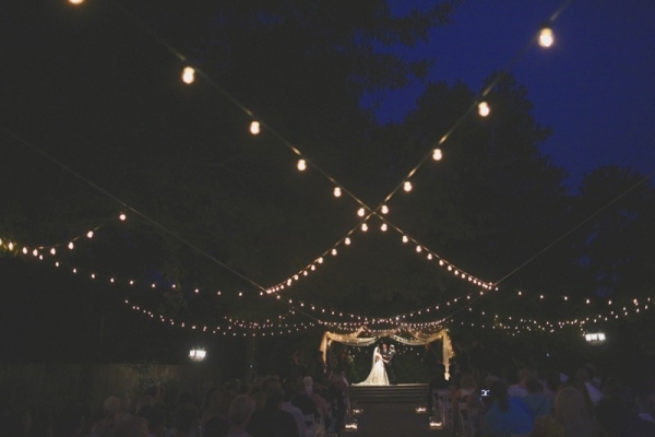 Nightime ceremony with string lights