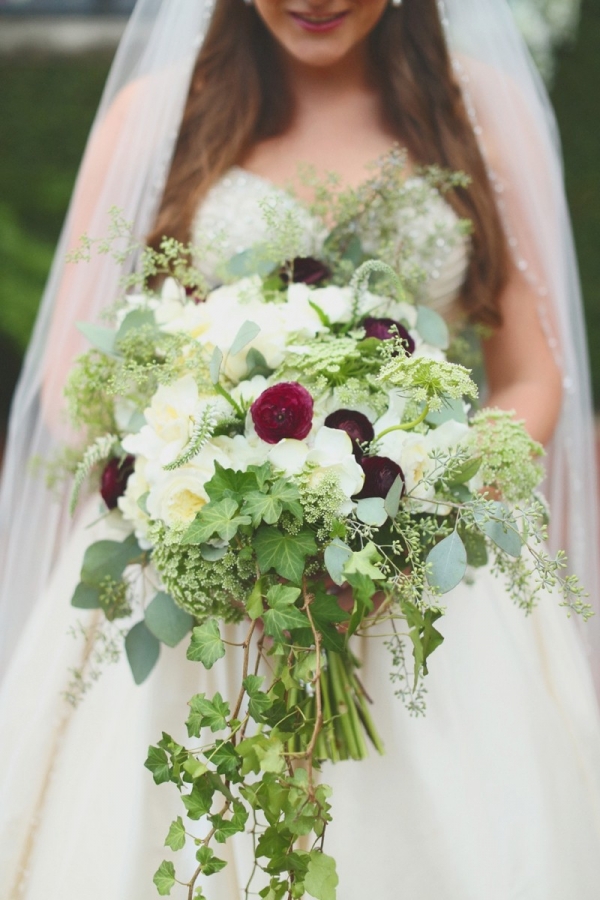 Green and white bouquet with red ranunculus 