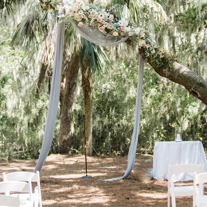 Draping and floral tree ceremony backdrop