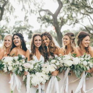 Bridesmaids in strapless blush gowns