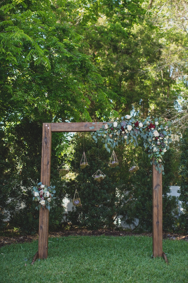 Wooden ceremony backdrop arch