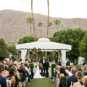Outdoor Palm Springs wedding ceremony under tent