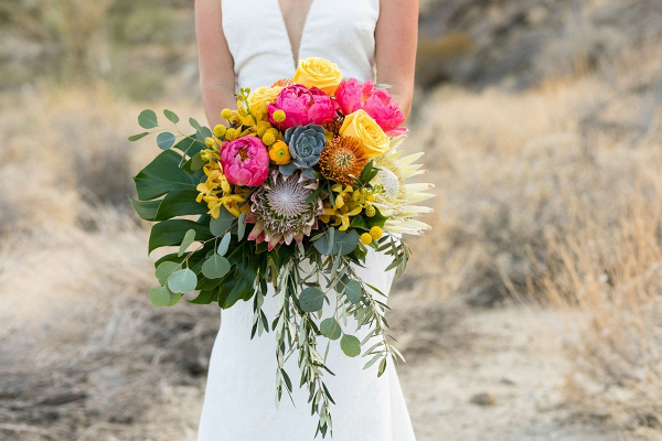 Bright peony and protea bridal bouquet