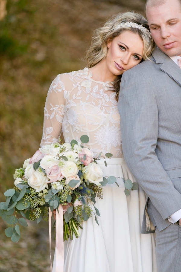 Blush bridal bouquet with greenery and ribbon
