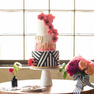 Pink and orange wedding cake with stripes