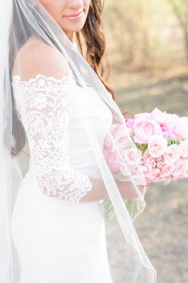 Bride in Lace Dress with Pink Bouquet