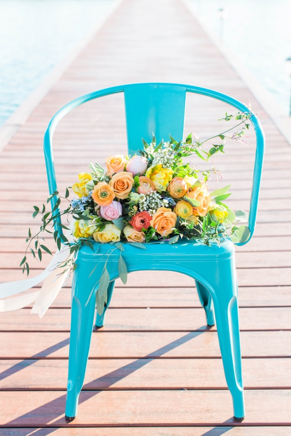 Turquoise Metal Chairs with Yellow Bouquet