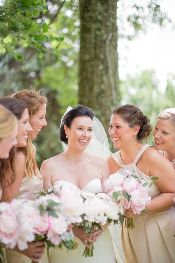 Bride With Bridesmaids In Neutral Dresses