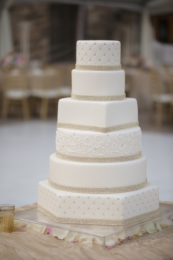 Clean and elegant white wedding cake 