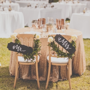 Reception chairs with Mr. & Mrs. signs