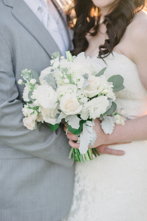 Bride And Groom With White Bouquet