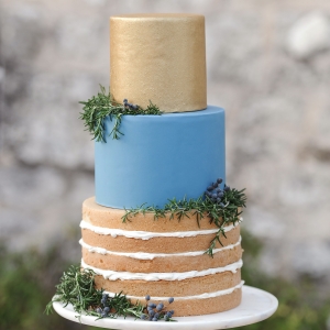 Blue and gold wedding cake